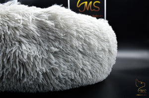 Coussin moelleux pour chat gris